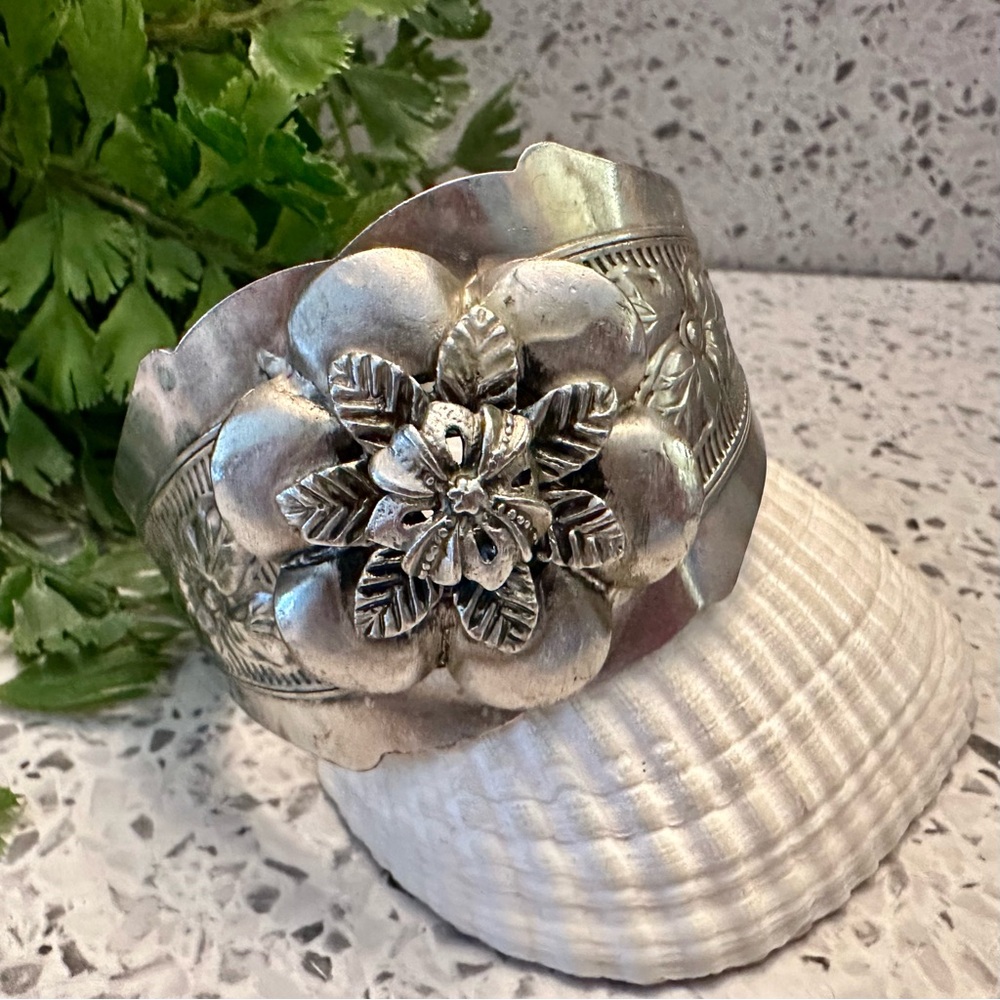 Silver tone Floral motif wide cuff bracelet